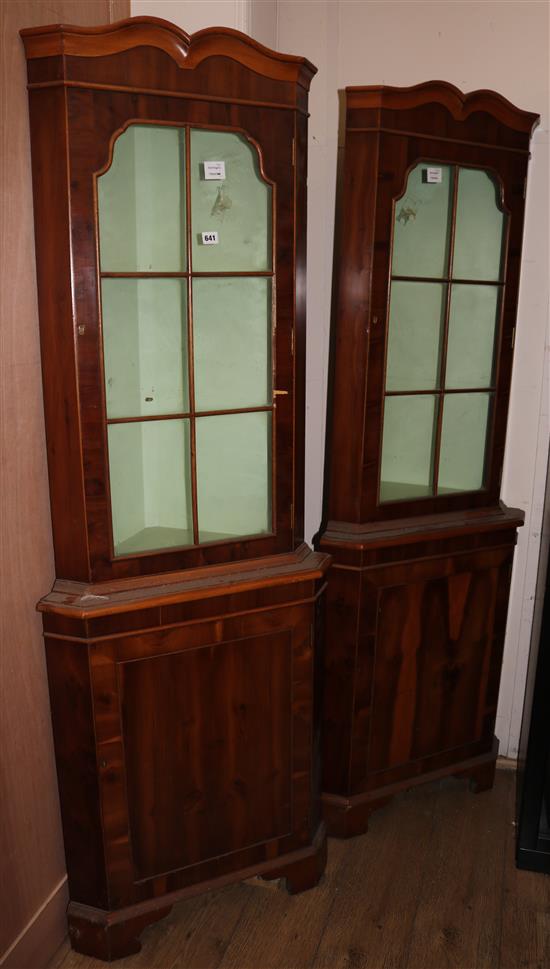 A pair George III style yew wood corner cupboards, H.187cm